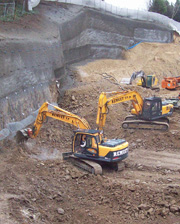Terrassement  dans rocher pour construction d'un parking aérien de 4 niveaux à Ecully